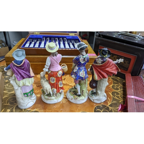 225 - Four late 19th Century, mainly German porcelain figures, in 18th Century costume 
Location:RAB