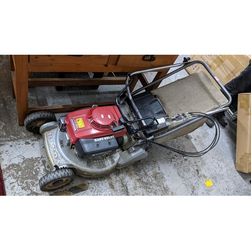 337 - A Honda QX easy start AR 194 lawn mover
Location:G