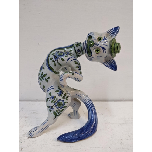 471 - A 20th century faience model of a cat in the Louis Wain/galle style
Location: 4.4