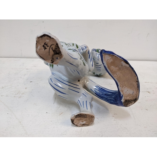 471 - A 20th century faience model of a cat in the Louis Wain/galle style
Location: 4.4