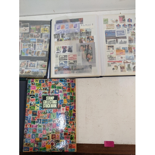 335 - A collection of worldwide stamps held in 6 albums, along with 1st day covers from the 1970s onwards,... 