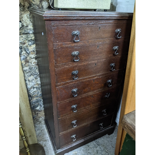 360 - An early 20th century oak tallboy chest of seven graduated drawers on bracket feet 118cm x 62cm x 41... 