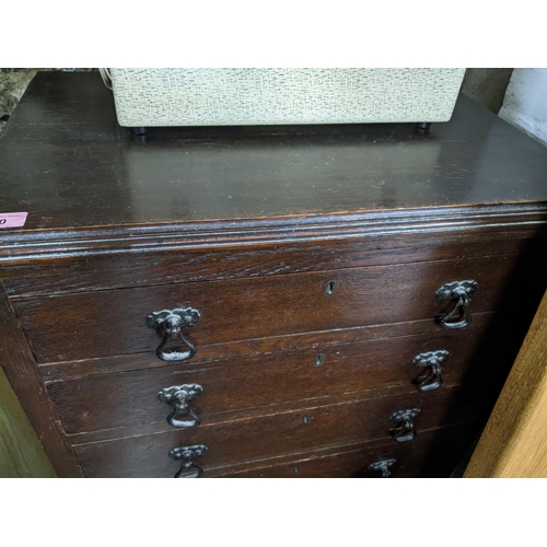 360 - An early 20th century oak tallboy chest of seven graduated drawers on bracket feet 118cm x 62cm x 41... 