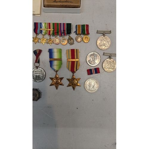 378 - A collection of WWI and WWII miniature medal bars to include a Royal Naval Reserve decoration and WW... 