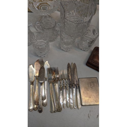 379 - A mixed lot to include a parquetry sewing box along with mixed cutlery to include knives and forks w... 