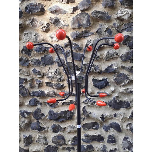 386 - A retro hat stand with red accents to the coat hooks and base below
Location: RAB