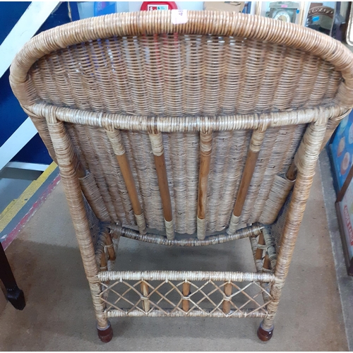 488 - An OKA wicker armchair
Location: RAM