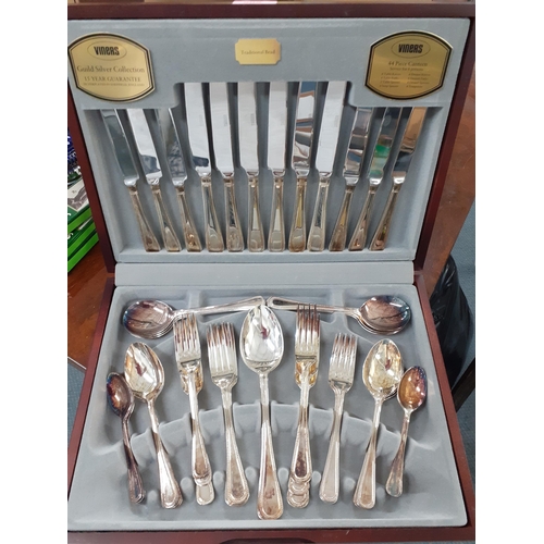 509 - A canteen of Viners 'Traditional Bead' 6 setting silver plated cutlery in a modern mahogany style bo... 