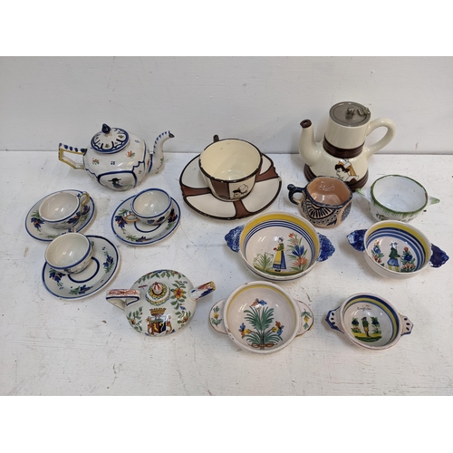 532 - Drinking related Quimper ware to include a matching teapot, large cup and saucer, tea pots, a set of... 