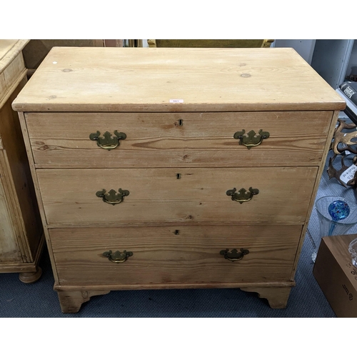 501 - A 19th century pine chest of three long drawers on bracket shaped feet 91cm h x 92cm w Location: LAM