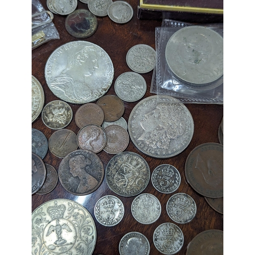 540 - A mixed collection of coins and banknotes to include 1921 'Morgan Dollar', Maria Theresa Thaler, Vic... 