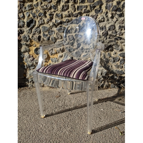 347 - A Louis Ghost Kartell transport polycarbonate armchair designed by Philippe Starck, with detachable ... 