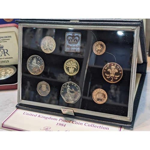 506 - A collection of UK Proof coins and coin sets to include 1971, 1984, 1996 and 2005 sets, cased Corona... 