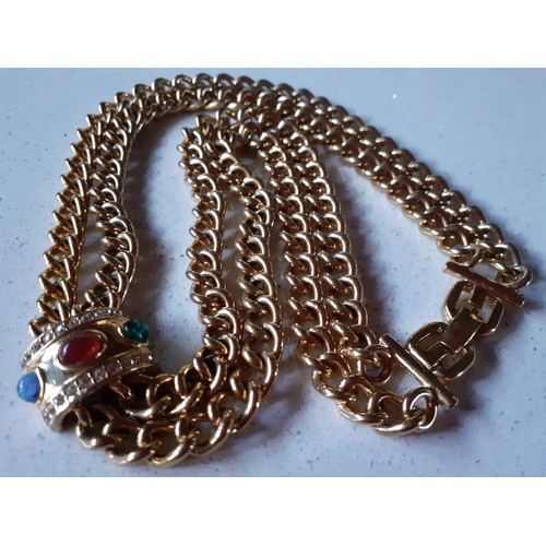 3 - Givenchy-A late 20th Century gold tone dual open chain necklace having a pendant with red, blue and ... 