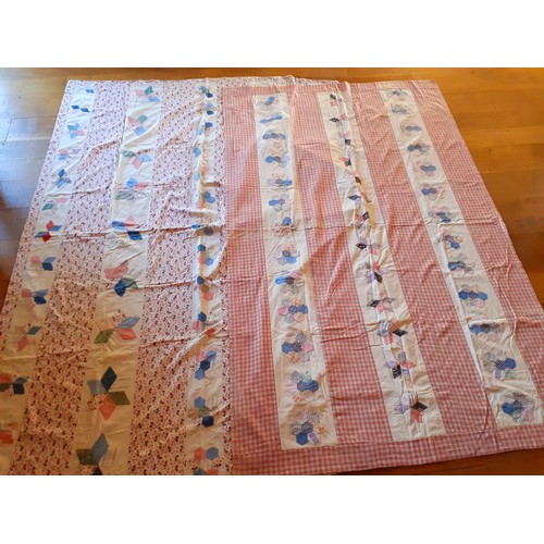 30 - Two mid 20th Century patchwork bedspreads measuring 135cm x 220cm (single bed) and 170cm x 235cm (sm... 