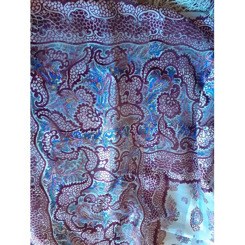 41 - A mid 19th Century Victorian wool gazar crinoline shawl A/F having a wide border in crimson and blue... 