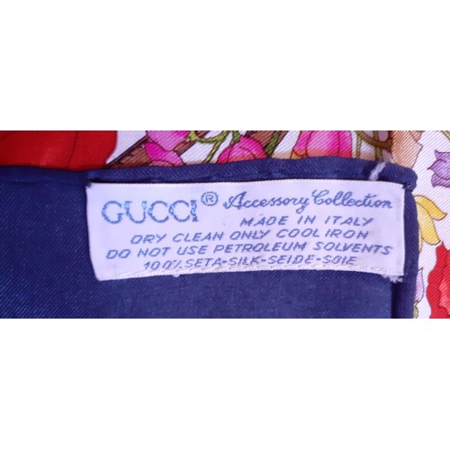 5 - Gucci- An Accessory Collection silk scarf with images of red poppies, wild flowers and brown belts o... 
