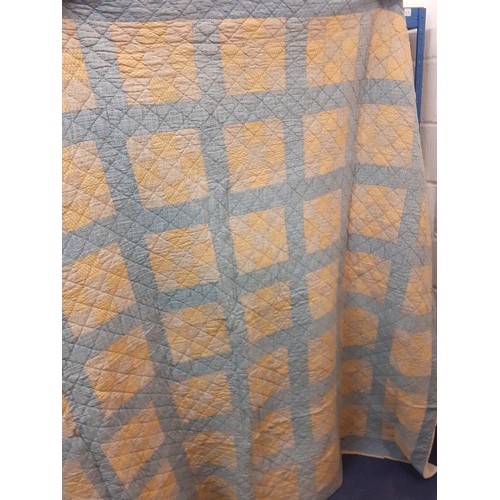 37 - A mid 20th Century American Mid West double layer handmade patchwork quilt in mustard yellow, blue, ... 