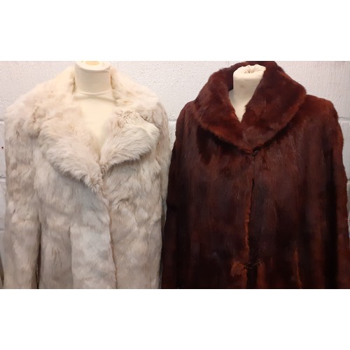 103 - A vintage arctic rabbit fur jacket with internal leather trim to the fastening, 38