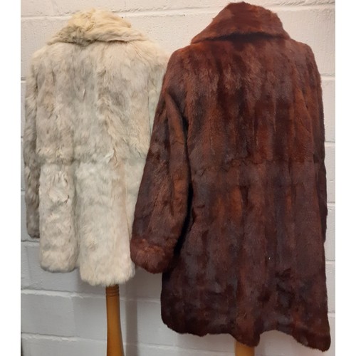 103 - A vintage arctic rabbit fur jacket with internal leather trim to the fastening, 38