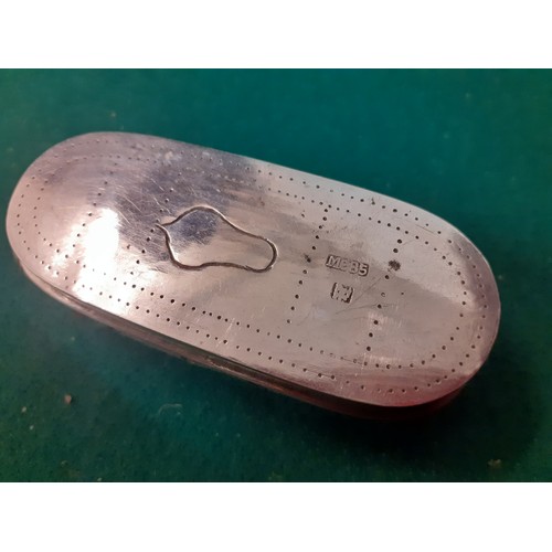 105 - A 20th Century Chinese white metal pin cushion in the form of a slipper with red velvet cushion toge... 