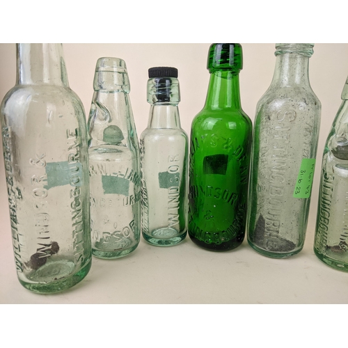 43 - Twelve Williams & Dean, Windsor mineral water bottles to include three Beavis patent Codds and a gre... 