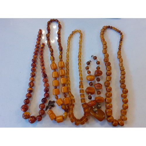 70 - Five vintage necklaces to include butterscotch amber. Location:R1.4