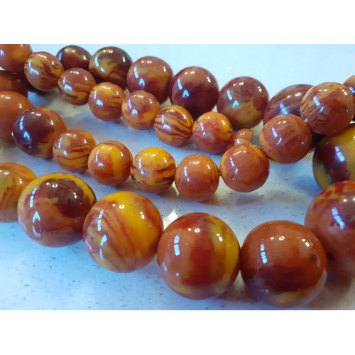 70 - Five vintage necklaces to include butterscotch amber. Location:R1.4