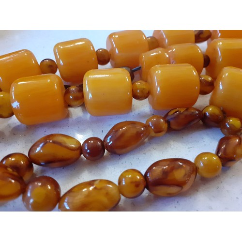 70 - Five vintage necklaces to include butterscotch amber. Location:R1.4