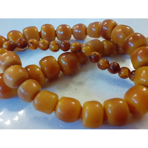 70 - Five vintage necklaces to include butterscotch amber. Location:R1.4