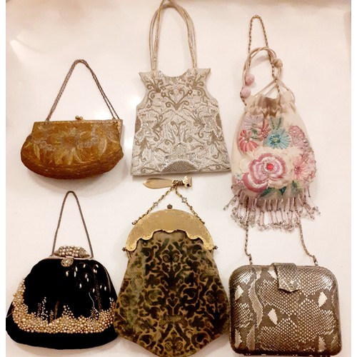 63 - A collection of mid 19th Century and later evening bags to include a mid 19th Century crotchet retic... 