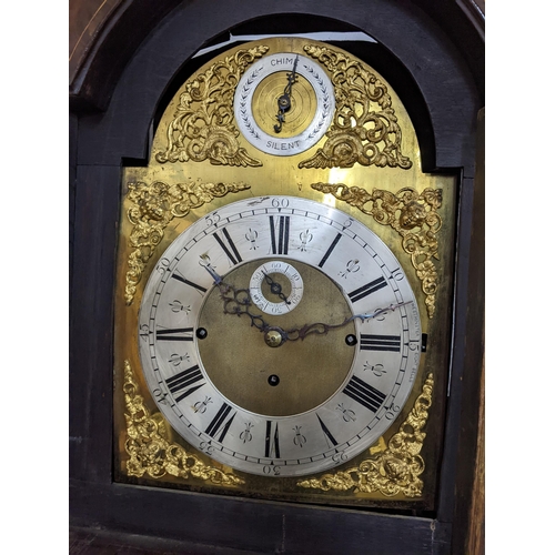 51 - A George III mahogany musical longcase clock, the case having a broken swan neck pediment, marquetry... 