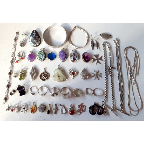 71 - A quantity of mainly silver and white metal jewellery to include a silver bangle with Egyptian desig... 