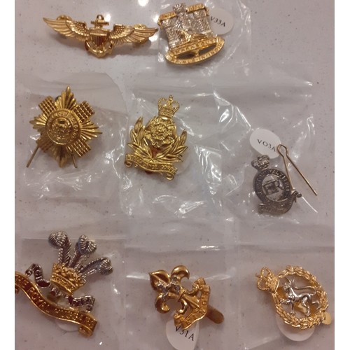 72 - A quantity of Ammo UK, Firmin and other British cap badges to include Royal Hampshire, The Royal Gre... 