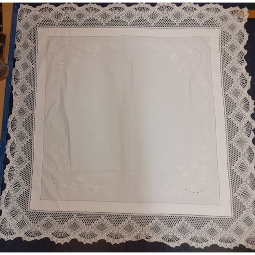 120 - A quantity of vintage table linen to include a Madeira beige and ecru cutwork tablecloth 46