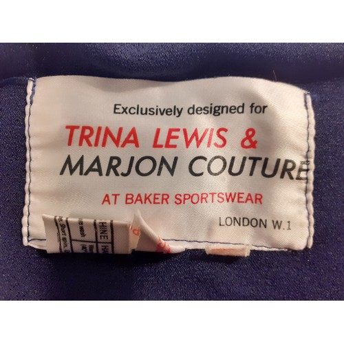 118 - A late 1970's Trina Lewis & Marjon Couture navy wrap-around dress with plunge neckline, UK size 14. ... 