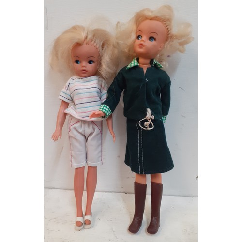 53 - Two 1980's 2nd Generation dolls stamped 2 GEN 033055X to the rear of the neck wearing clothing and f... 