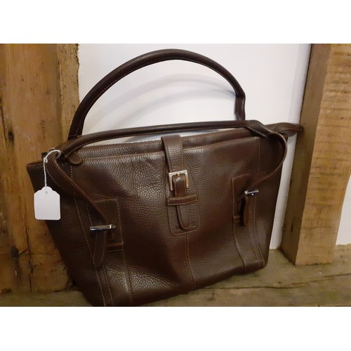 10A - Loewe-A dark brown 'Senda' handbag, 40cm Wide x 22cm High, having 2 rolled leather handles, silver t... 