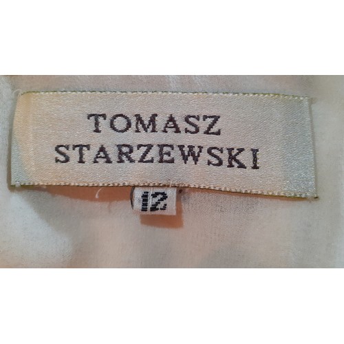 88 - Tomasz Starzewski-A cream silk evening dress with short scalloped sleeves and elasticated waistband ... 