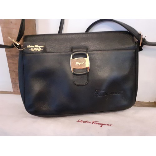 89 - Salvatore Ferragamo- A 'Boutique' black leather shoulder bag with gold tone hardware having an outer... 