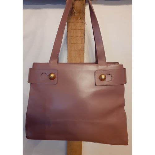 93 - A modern Furla dusty pink leather shoulder bag, as new, having gold tone hardware, 40cm wide x 30cm ... 