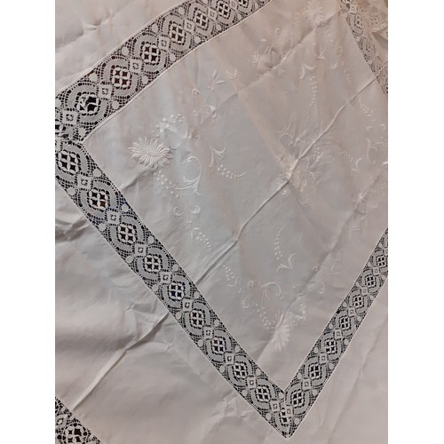 124 - An early 20th Century very large white cotton tablecloth with crotchet insertions 235cm x 290cm (goo... 