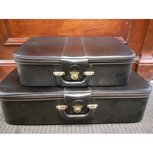 130 - Two vintage Victor black leather suitcases with red silk lining, one 27