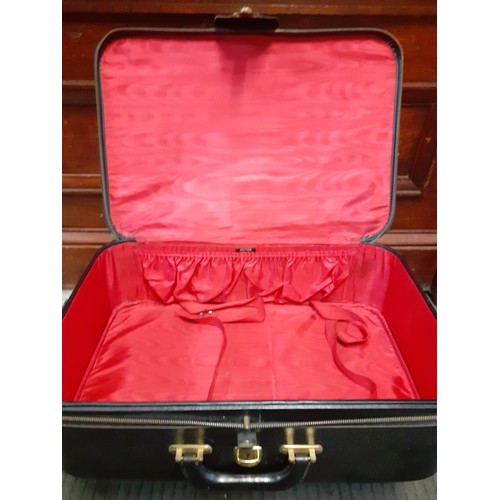 130 - Two vintage Victor black leather suitcases with red silk lining, one 27