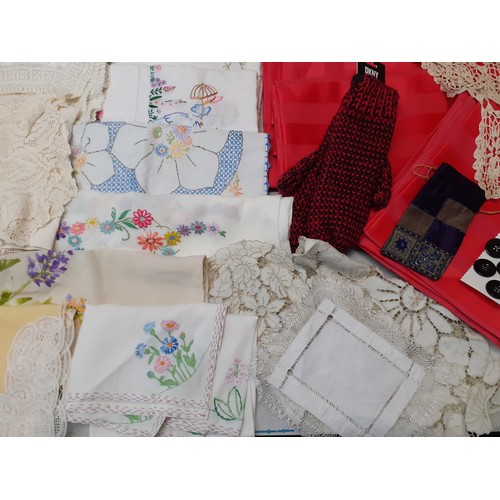 133 - A large quantity of vintage table linen together with a pair of new DKNY woollen gloves and other it... 