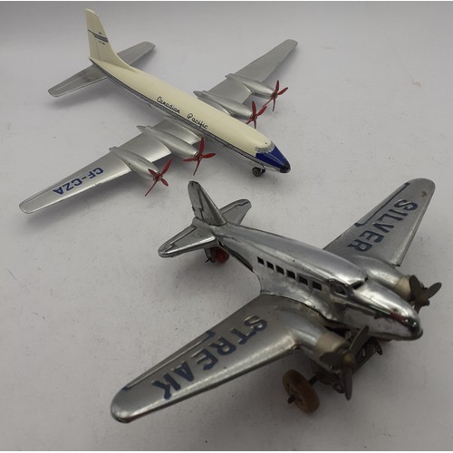 60 - A vintage Silver Streak clockwork model of an aircraft nO:20215 in original box together with a Dink... 