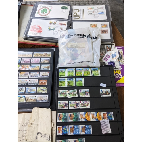 155 - A stamp collection to include 1st day covers, circa 1960s/70s, mounted in two albums, and various wo... 