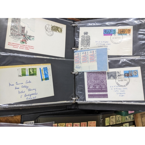 155 - A stamp collection to include 1st day covers, circa 1960s/70s, mounted in two albums, and various wo... 