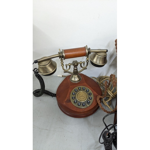 184 - Mixed telephones to include a Bell telephone, mid century French telephone receiver of Phenolic styl... 