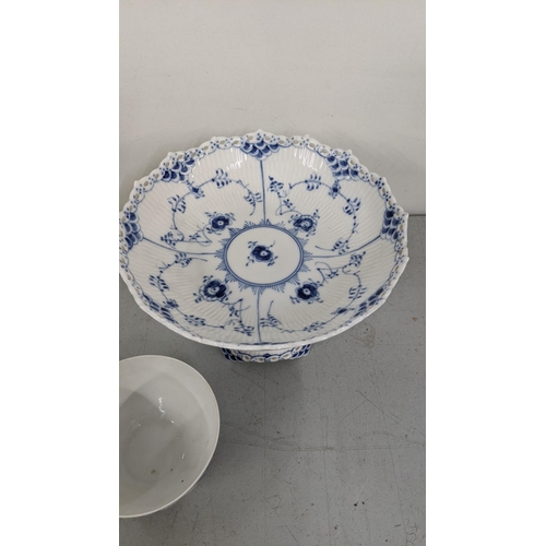 209 - A Royal Copenhagen comport/tazza in the blue onion pattern, number 1020, together with a bowl, numbe... 